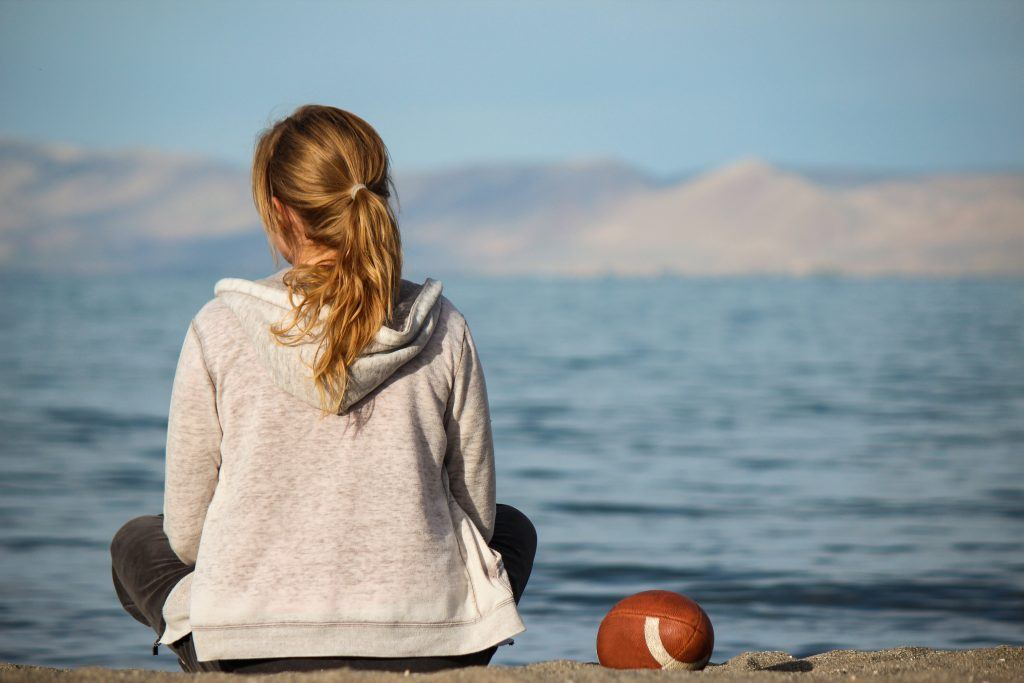 Lonely Woman Sitting on the Beach NFL Ex-Wives and QDROs (Garcia-Tatupu v. Bert Bell/Peter Rozelle NFL Player Ret. Plan)