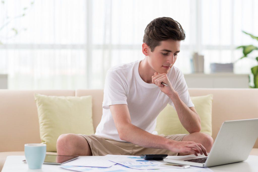 Young businessman Ask Carolyn: What should I teach my teenager about finances?