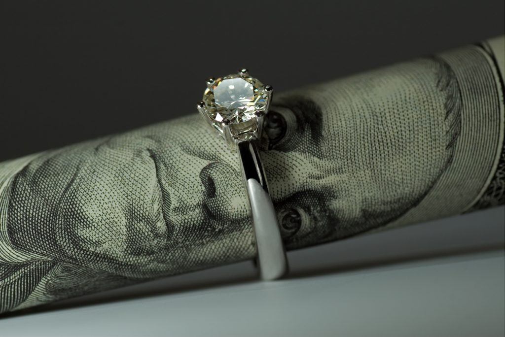 Diamond ring on a dollar We’re Separated, but I Still Owe Money on the Engagement Ring!