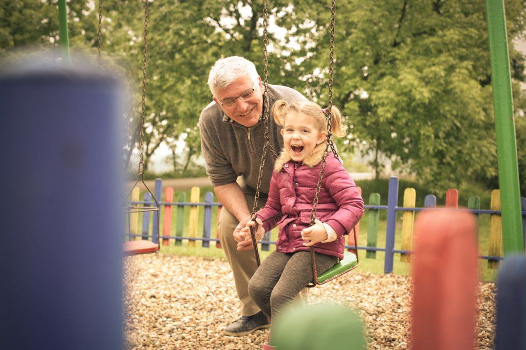 Grandfather and granddaughter. Ask Carolyn: How Can I Help with My Grandchild’s Day Care Tuition?