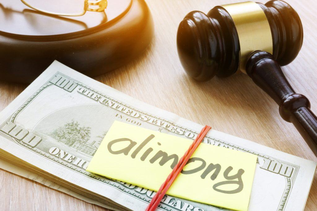 Alimony on a court desk. Divorce and separation concept Ask Carolyn: My Soon-to-Be Ex Would Rather Get Alimony Than Work!