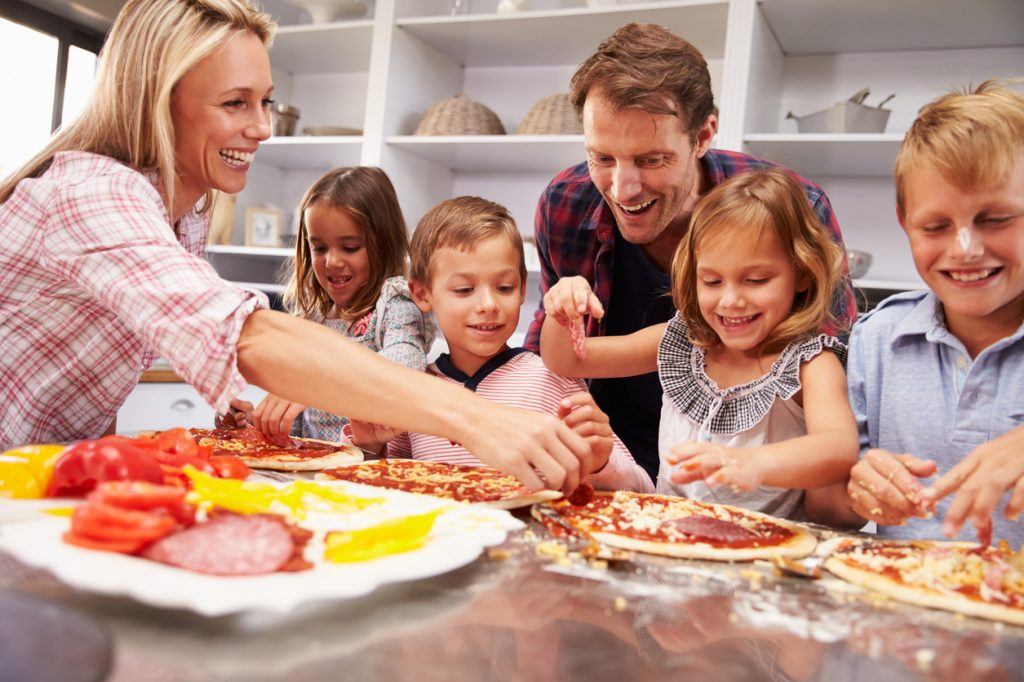 Family making pizza for dinner Communication is Key: Tips for Family Communication (Part 3)
