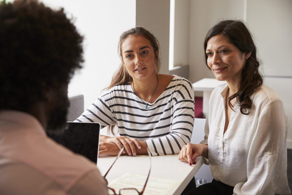 Mother And Daughter Meeting With Male Teacher Communication is Key: Parent-Teacher Communication (Part 4)