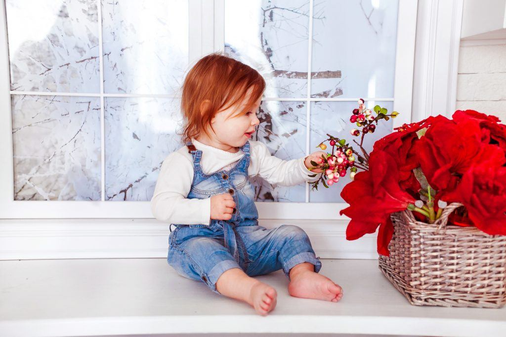 Canva - Kid's Blue Denim Jumper Sitting on White Wooden Side Table Looking Out for Our Kids: QDROs and Employer-Provided Life Insurance.