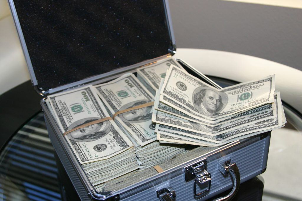 Canva - Piles of U.s. Dollar Bills on Silver and White Suitcase “Paid in Full” isn’t always a good thing…Be careful of fine print.